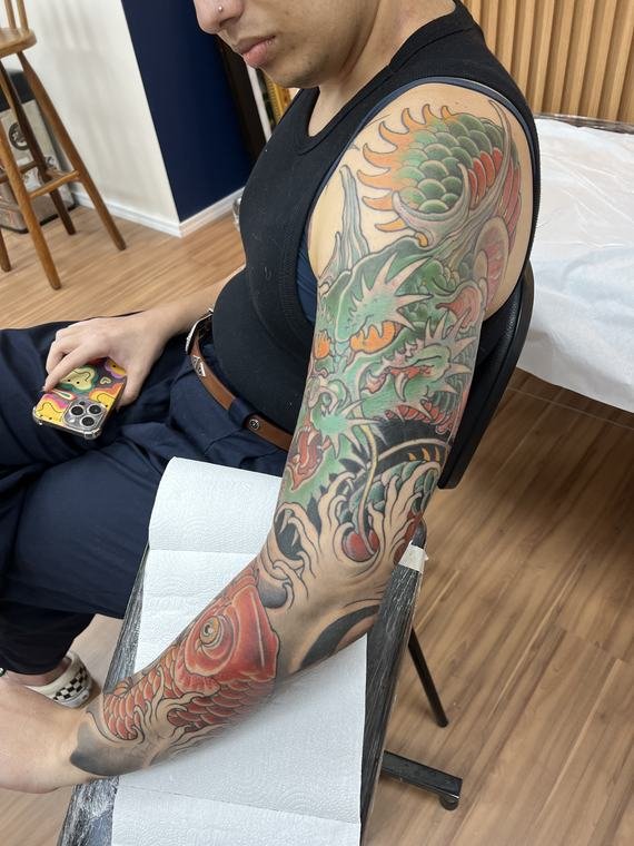 Dragão verde, tatuagem de Denis Vazios