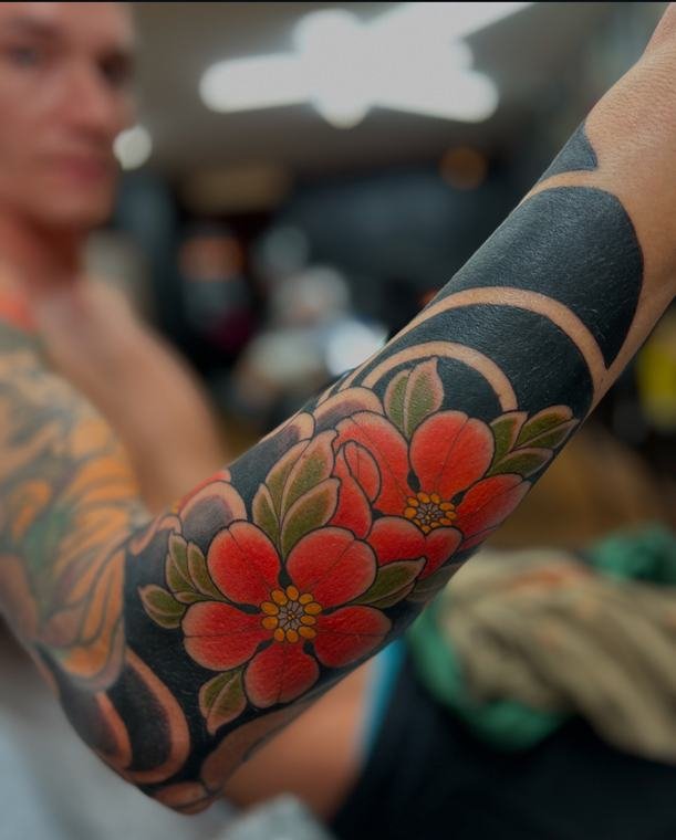 Cerejeiras e ondas, tatuagem de Denis Vazios